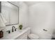 Clean and modern bathroom with white countertops, sleek fixtures, and a decorative plant at 4547 Kings Ct, Hickory, NC 28602