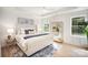 Bright bedroom features a comfortable bed, decorative artwork, and natural light at 4547 Kings Ct, Hickory, NC 28602
