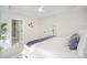 Bright bedroom features a comfortable bed, decorative artwork, and an en suite bathroom at 4547 Kings Ct, Hickory, NC 28602