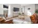 Bright and inviting living room featuring hardwood floors, a comfortable seating arrangement, and natural light at 4815 & 4817 Victoria Dr, Charlotte, NC 28269