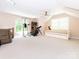 Spacious bonus room featuring carpet, exercise equipment, and trundle bed at 5417 Bedfordshire Ave, Harrisburg, NC 28075
