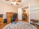 The home office has a lovely round rug, lots of natural light, and connects to the bedroom at 5417 Bedfordshire Ave, Harrisburg, NC 28075