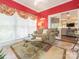 Cozy sunroom with tile flooring, sliding glass doors, and comfortable seating at 5417 Bedfordshire Ave, Harrisburg, NC 28075