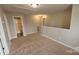 Neutral bedroom featuring wall to wall carpeting and a bright window for natural light at 5823 Natick Dr, Charlotte, NC 28214