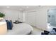 Bright and airy bedroom with plush carpet, featuring multiple closets and ensuite bath access at 5910 Grosner Pl, Charlotte, NC 28211