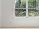 A bedroom with an abundance of natural light showcasing the green outdoors at 5910 Grosner Pl, Charlotte, NC 28211