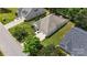 An aerial view of the home features a well maintained lawn, a driveway, and a two-car garage at 611 Tee Ridge Ct, Fort Mill, SC 29715