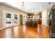 Bright eat-in kitchen with hardwood floors, dark wood cabinets, and a central island at 611 Tee Ridge Ct, Fort Mill, SC 29715