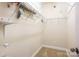 Bright walk-in closet with wire shelving and neutral carpet at 611 Tee Ridge Ct, Fort Mill, SC 29715