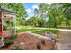 Well maintained front yard with manicured landscaping, garden beds and a street view at 625 N Center St # 4, Statesville, NC 28677