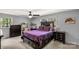 Main bedroom features a large bed and dark wood furniture at 709 Plantation Rd, Lancaster, SC 29720