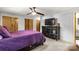 Main bedroom features a ceiling fan and ensuite bathroom access at 709 Plantation Rd, Lancaster, SC 29720