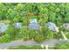 A beautiful home with a pool is nestled among mature trees in a desirable neighborhood at 7812 Seton House Ln, Charlotte, NC 28277