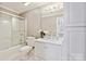 Bathroom featuring bathtub-shower combo and vanity with countertop and storage at 7812 Seton House Ln, Charlotte, NC 28277