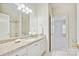 Bright bathroom with single vanity, shower with glass door at 7812 Seton House Ln, Charlotte, NC 28277