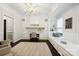 Charming home office with custom cabinets, window seat, and elegant decor at 7812 Seton House Ln, Charlotte, NC 28277