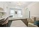 Inviting office space with custom built-ins, window seat, and elegant decor at 7812 Seton House Ln, Charlotte, NC 28277