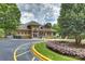 Community clubhouse featuring an inviting entrance and well-maintained landscaping at 7833 Taymouth Ln, Charlotte, NC 28269
