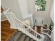 A grand entryway features a striking chandelier and large window above the door, plus hardwood floors at 7833 Taymouth Ln, Charlotte, NC 28269