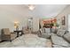 Spacious living room with hardwood floors and lots of natural light at 7833 Taymouth Ln, Charlotte, NC 28269