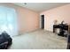 Spacious bedroom with plush carpet, natural light and a walk-in closet at 815 Fescue Ct, Charlotte, NC 28216