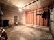 Attached garage with ample storage space, perfect for parking and organizing at 815 Fescue Ct, Charlotte, NC 28216