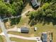 Birds eye view showcases the spacious backyard, metal storage shed, and neighborhood homes at 975 Mt Moriah Church Rd, China Grove, NC 28023