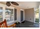 Cozy front porch featuring a comfortable chair and a charming view, perfect for relaxing outdoors at 975 Mt Moriah Church Rd, China Grove, NC 28023