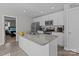 Stylish kitchen with white cabinets, stainless steel appliances, and a functional island, ideal for cooking and entertaining at 975 Mt Moriah Church Rd, China Grove, NC 28023
