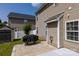 Backyard features a grill and a storage shed, bordered by a pristine white fence at 10815 Mountain Springs Dr, Charlotte, NC 28278