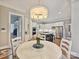 A kitchen that flows into a dining area, creating an inviting space for cooking and socializing at 11321 James Jack Ln, Charlotte, NC 28277