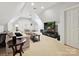 Spacious living room with vaulted ceilings, comfortable seating, and a large flat-screen television at 11321 James Jack Ln, Charlotte, NC 28277