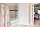 Tile bathroom with separate tub, shower, and doorway to bedroom at 123 Yellow Jacket Cir, Mooresville, NC 28117