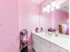 Pink full bathroom with white cabinets and sink at 123 Yellow Jacket Cir, Mooresville, NC 28117