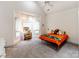 Bright bedroom features a bed, study area, and ample natural light, perfect for rest and creativity at 123 Yellow Jacket Cir, Mooresville, NC 28117