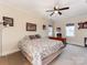 Cozy bedroom featuring a bed and a dark wood desk at 123 Yellow Jacket Cir, Mooresville, NC 28117
