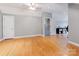 Bonus room with hardwood flooring and neutral colored walls at 123 Yellow Jacket Cir, Mooresville, NC 28117