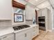Kitchen with white cabinets, stainless steel appliances, and a cooktop with tile backsplash at 123 Yellow Jacket Cir, Mooresville, NC 28117