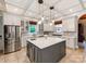 Gourmet kitchen with large island, stainless steel appliances, and custom cabinetry at 123 Yellow Jacket Cir, Mooresville, NC 28117