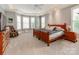 Spacious primary bedroom with a bay window, custom trim, and a seating area at 123 Yellow Jacket Cir, Mooresville, NC 28117