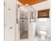 Shower room featuring a glass door, and a tiled walls, combining functionality and style at 123 Yellow Jacket Cir, Mooresville, NC 28117