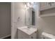 This bathroom features a large mirror above the sink at 133 Pheasant Run Rd, Troutman, NC 28166