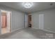 This bedroom has an ensuite bathroom and closet for ample storage at 133 Pheasant Run Rd, Troutman, NC 28166