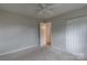 Bright carpeted bedroom with closet and white trim at 133 Pheasant Run Rd, Troutman, NC 28166