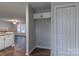 View from the kitchen looking into the bright open living area, creating a seamless and inviting space at 133 Pheasant Run Rd, Troutman, NC 28166
