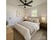 Comfortable bedroom with ceiling fan and dresser at 1401 Woodman Hall St, Shelby, NC 28152