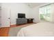 Bedroom with natural light, neutral colors, and hardwood floors at 14336 Northridge Dr, Charlotte, NC 28269