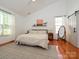 Bright main bedroom with high ceilings, large windows, and hardwood floors at 14336 Northridge Dr, Charlotte, NC 28269