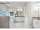 Bright bathroom showcasing a soaking tub, glass shower, dual sinks, and granite countertops at 145 Yellow Birch Loop, Mooresville, NC 28117