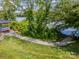 Scenic lakeside with a kayak access point, set in a lush natural landscape of trees and greenery at 145 Yellow Birch Loop, Mooresville, NC 28117